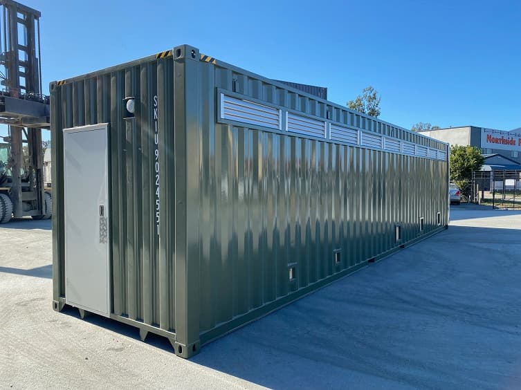 Modified 40ft shipping container with PA door and vents from Container Traders